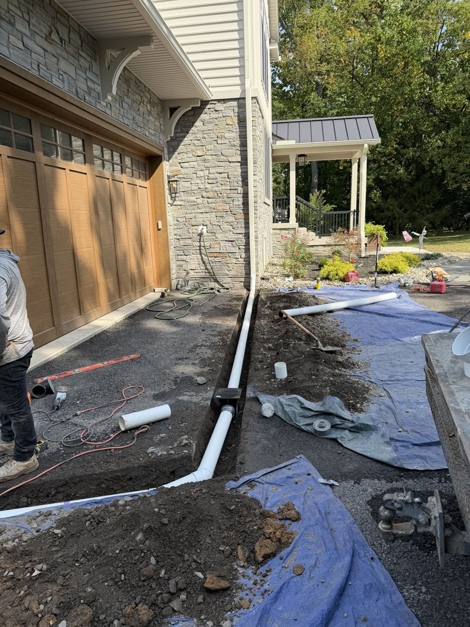 Gutter Drainage Installation & Asphalt Repair project photo 1
