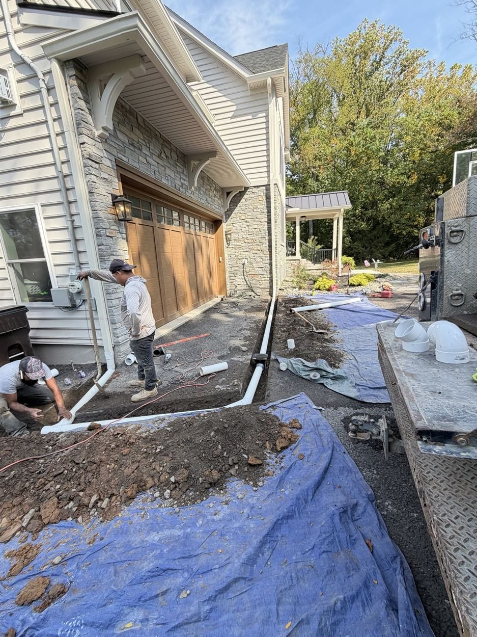 Gutter Drainage Installation & Asphalt Repair project photo 2