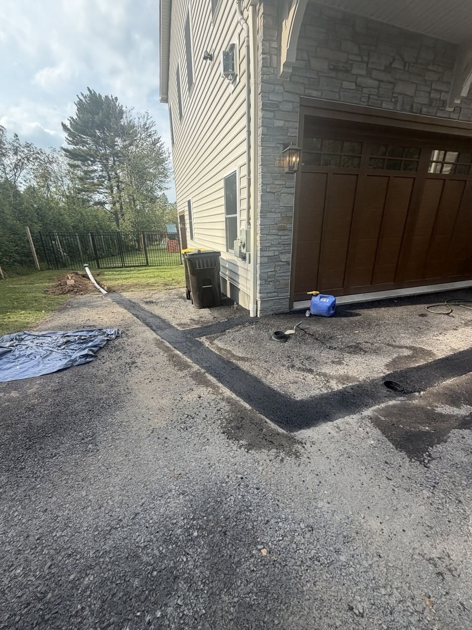 Gutter Drainage Installation & Asphalt Repair project photo 5