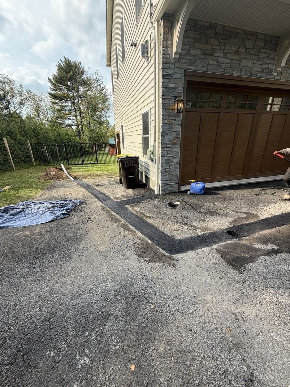 Gutter Drainage Installation & Asphalt Repair project photo 6